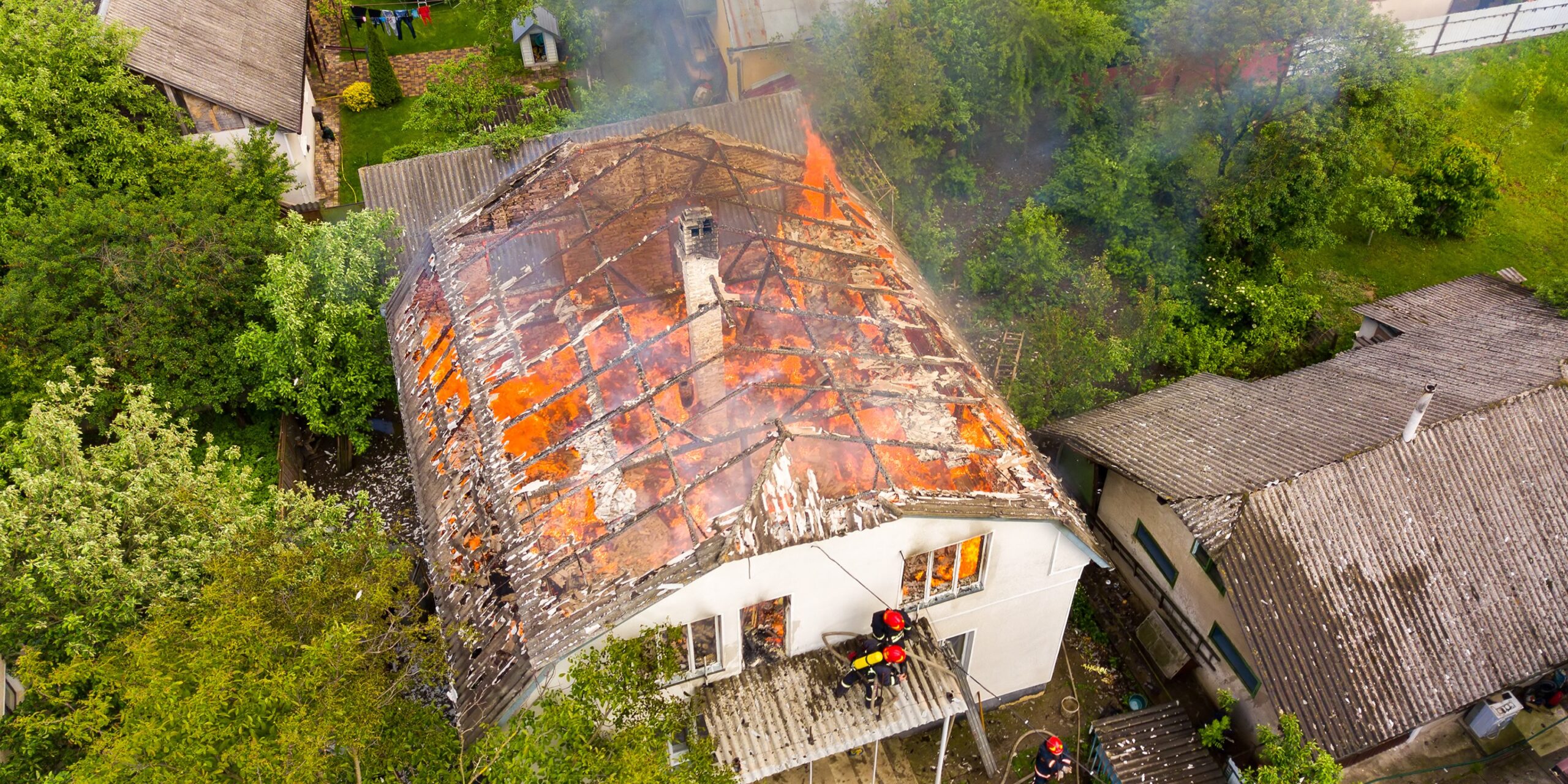 aerial view of a house on fire with orange flames 2024 12 06 11 57 55 utck scaled